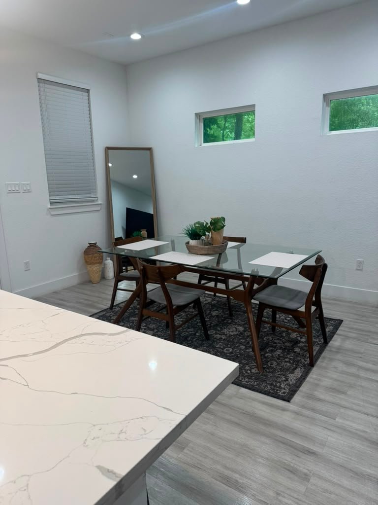 Clean living and dining area cleaned by Zulma Cleaning Services